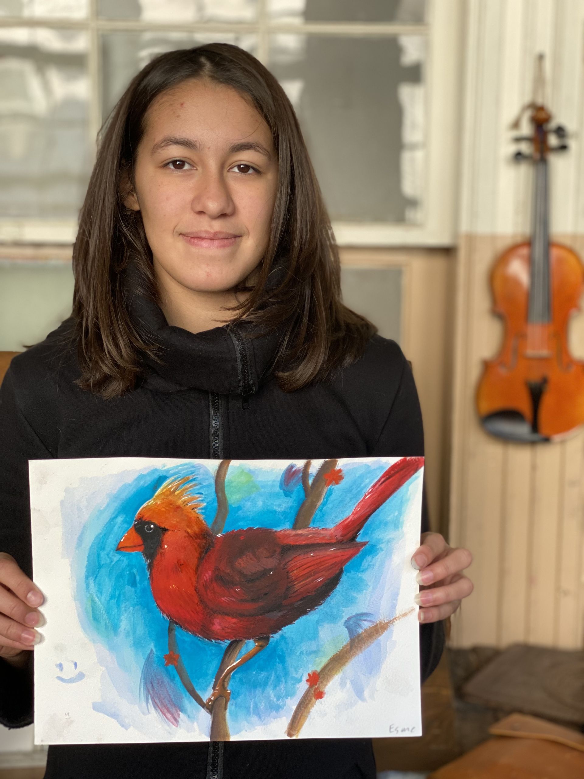 Homeschooler holding painting of Bird