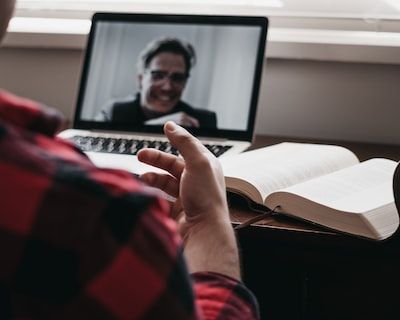 Two men speaking on a video call