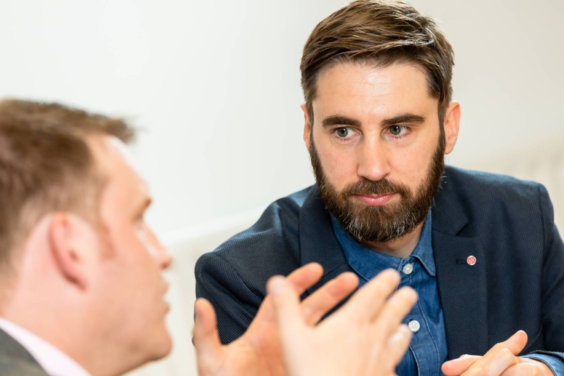 Matt listening to a coaching client speaking