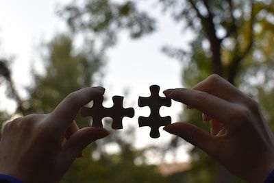 Two jigsaw pieces fitting together
