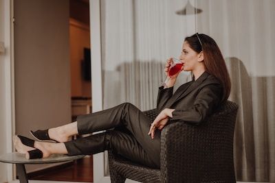 Woman chilling drinking a glass of wine