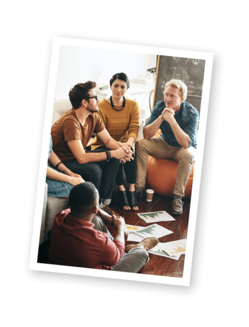 Divrse group of 4 people in informal meeting area