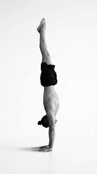 Miguel in a straight handstand