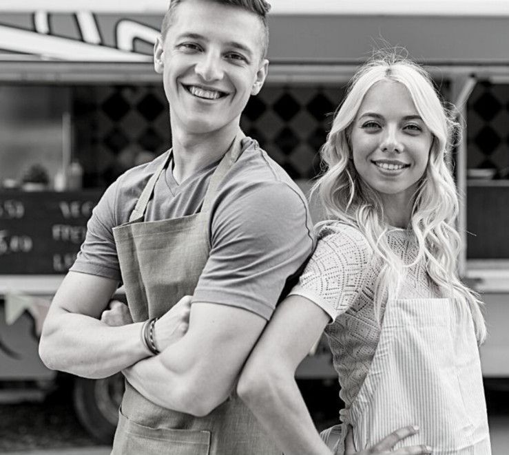 Teens in front of a food truck