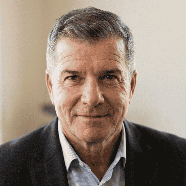 Headshot of Dominic Ogburn — CEO of ABE Education