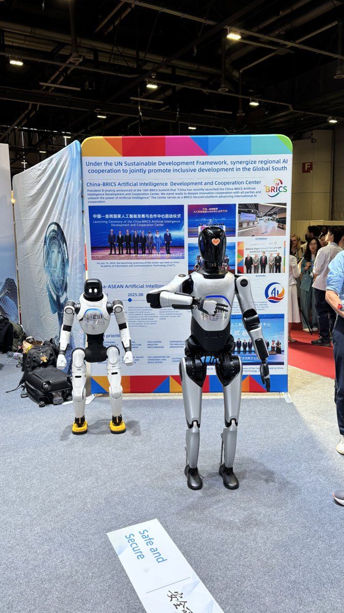 Two humanoid robots at China-BRICS AI stand
