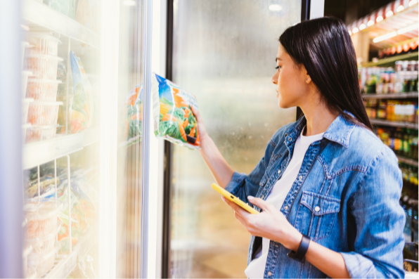 Woman Choosing Frozen Goods in Grocery RBQ 15.10