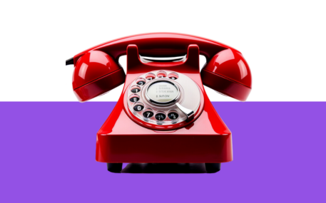 Red dial telephone epresenting hotline.