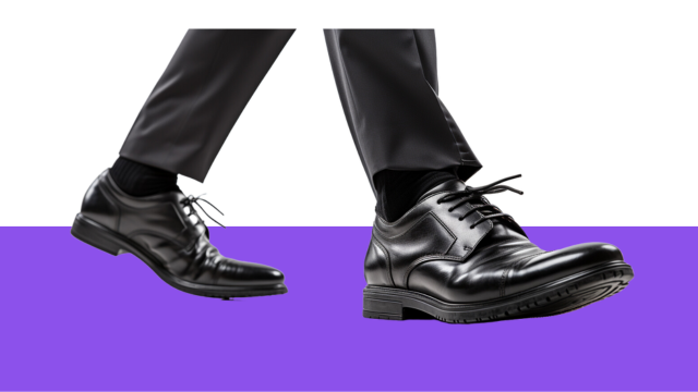 A pair of legs walking, symbolizing positive change empowered by solid compliance training.