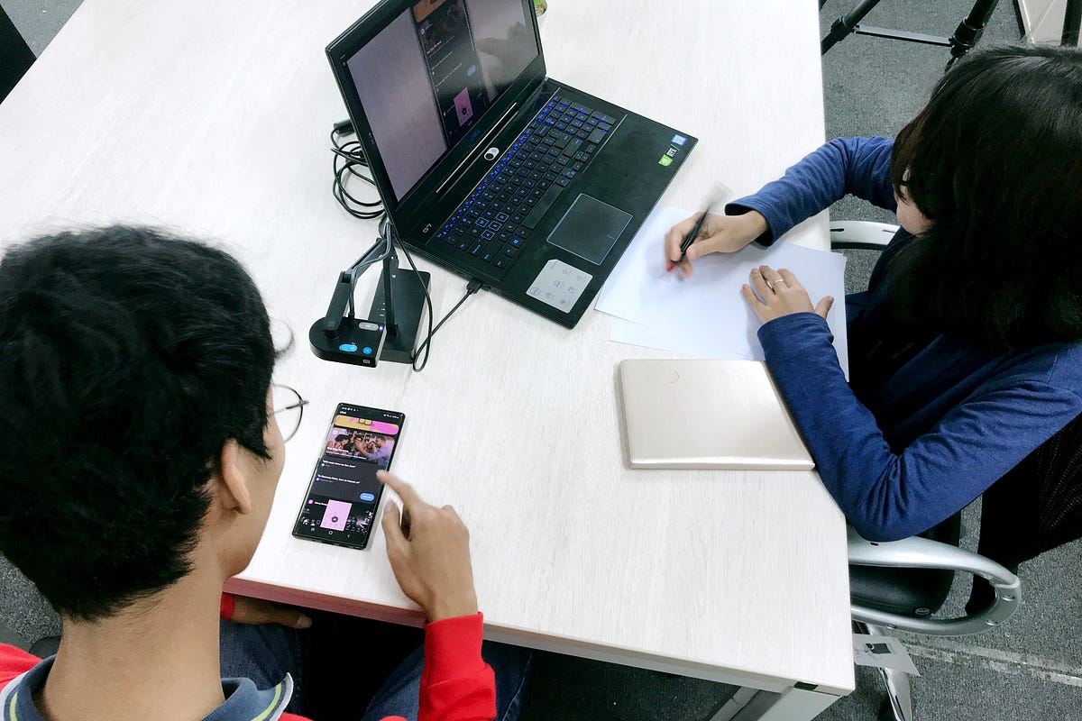 2 people working on a user interface design.