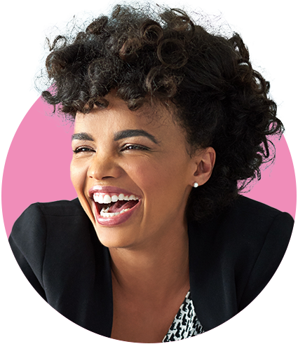 Woman with curly hair laughing