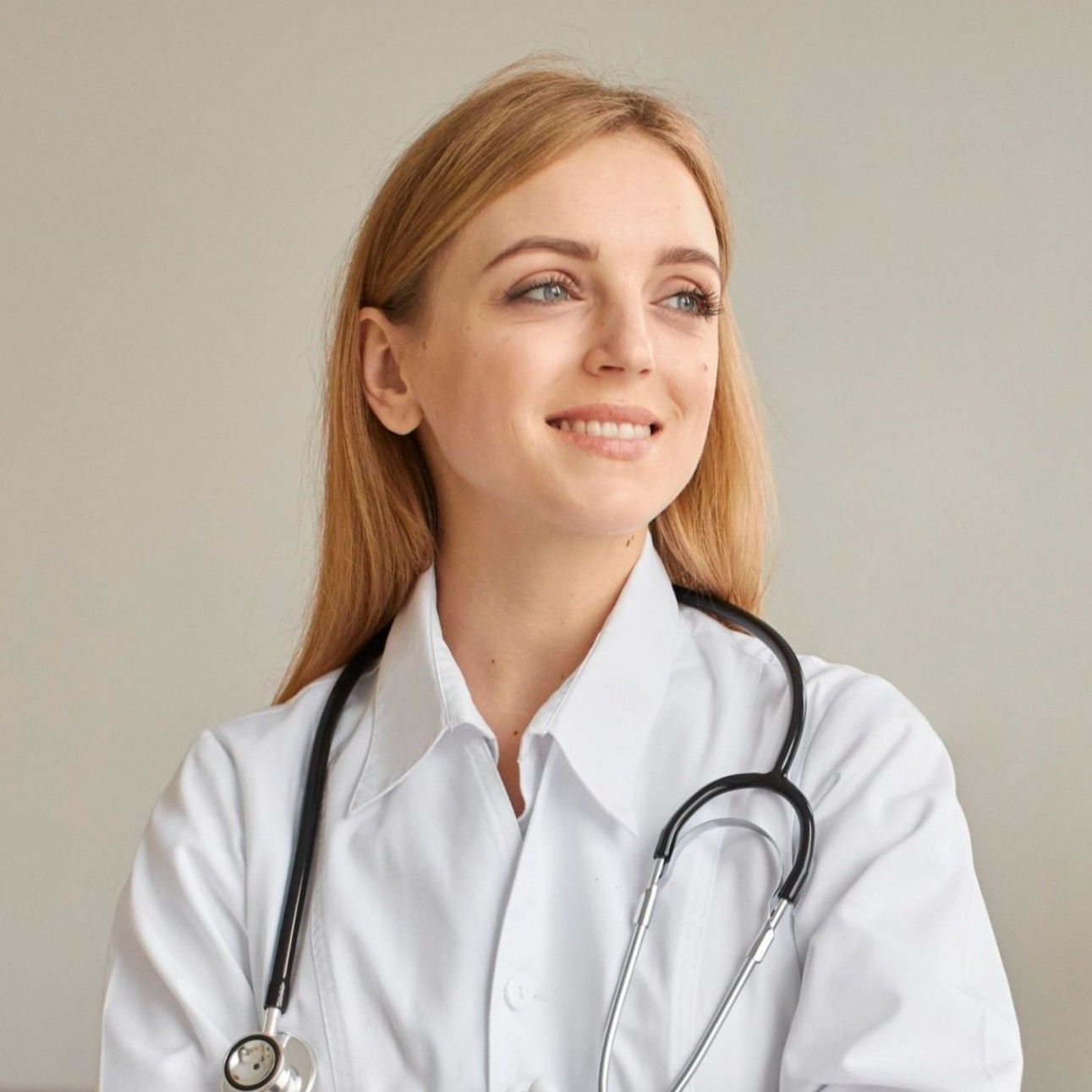 PracticeUP subscription photo of a young female doctor wearing a stethoscope