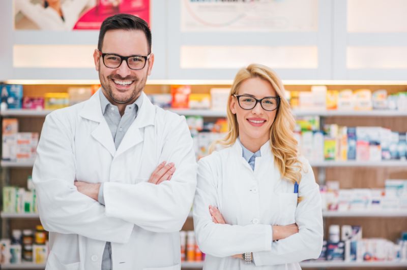 Two pharmacy technicians working together in a pharmacy
