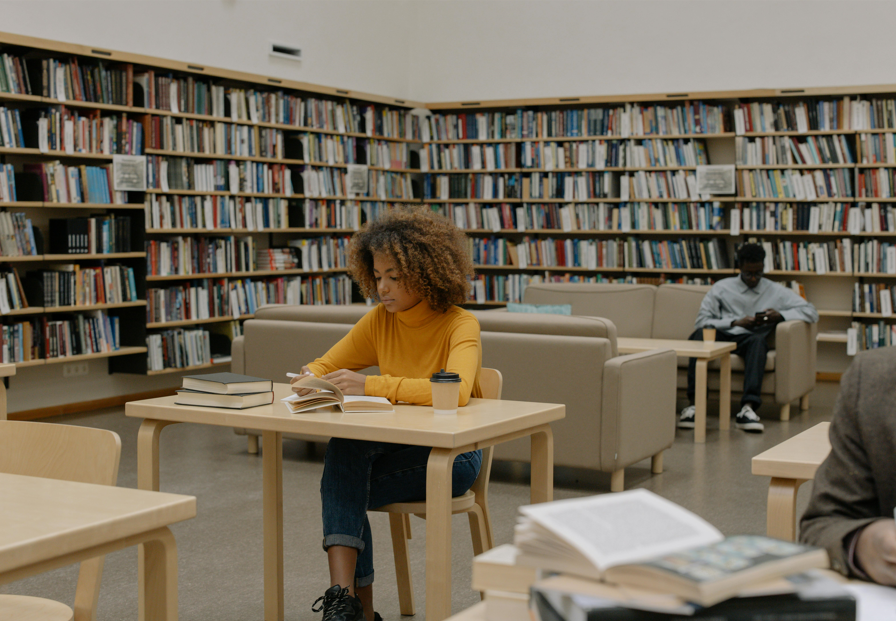 Woman studying in library 
