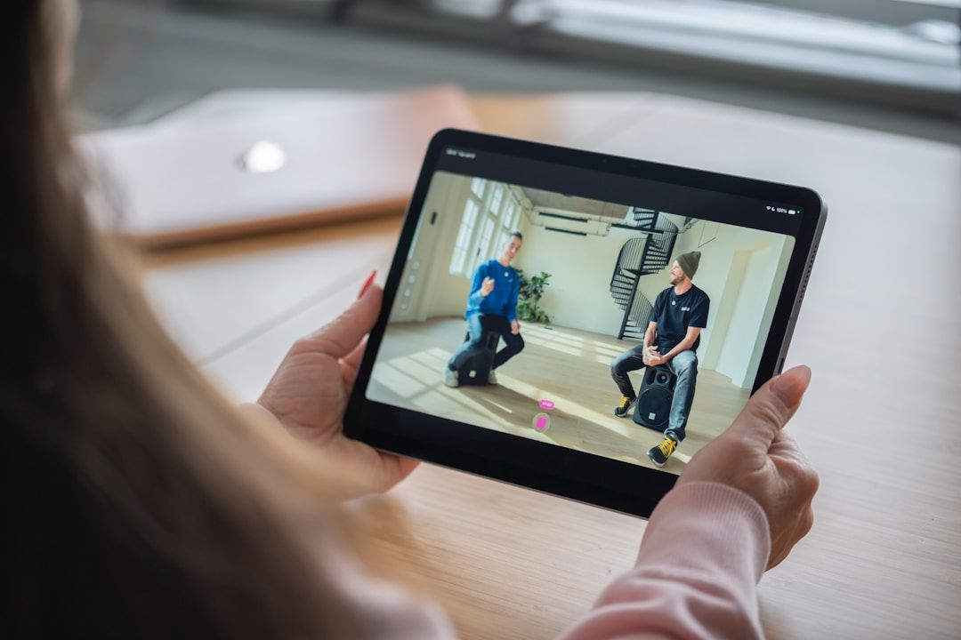 Person reviewing a corporate compliance training session on a tablet device
