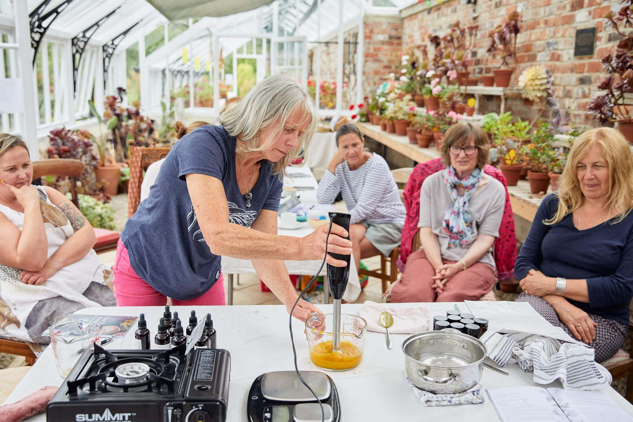 students attend herbalism course in person