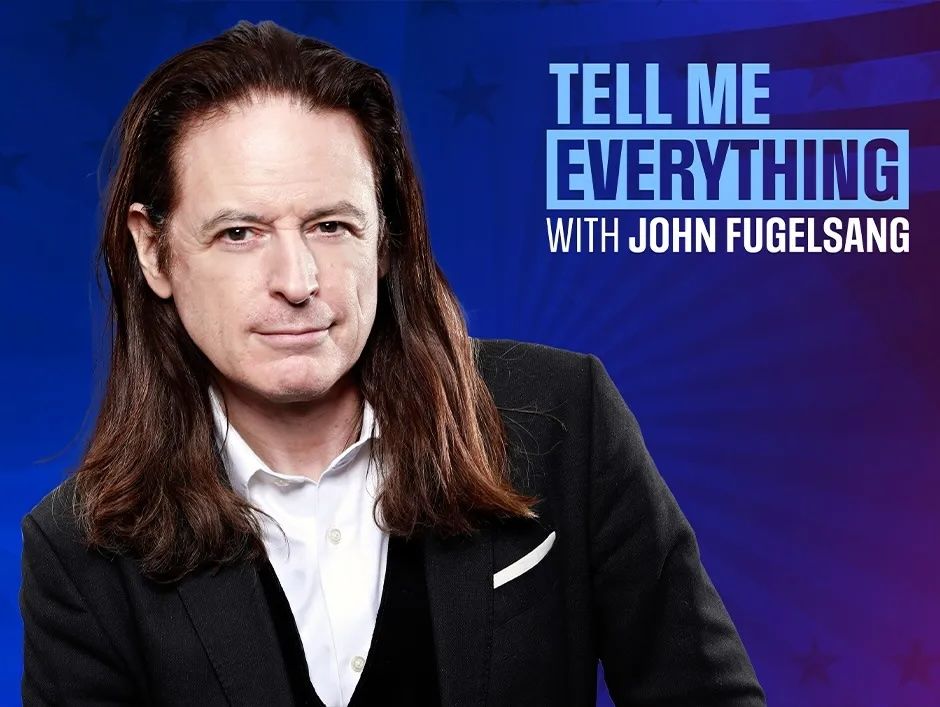 Man with long brown hair in a suit, set against a blue background with the text "Tell Me Everything with John Fugelsang." The tone is professional and engaging.