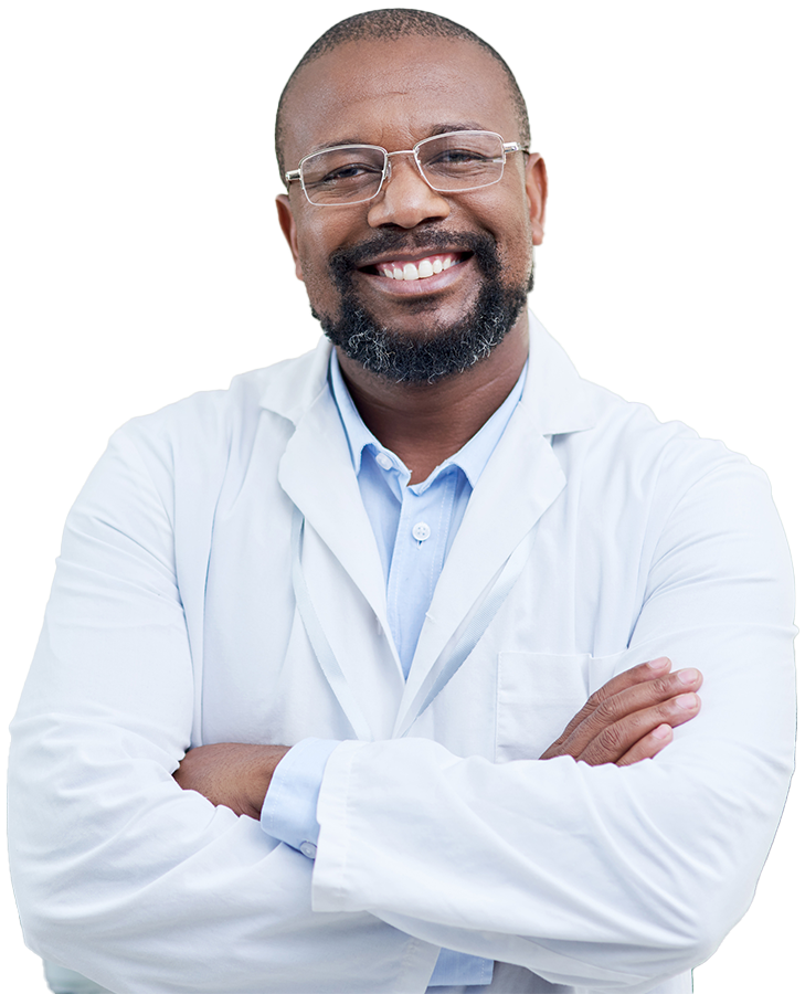 Man in lab coat and glasses smiling with crossed arms