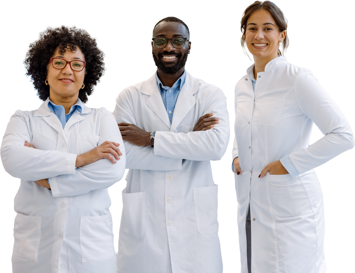A group of scientists in lab coats smiling