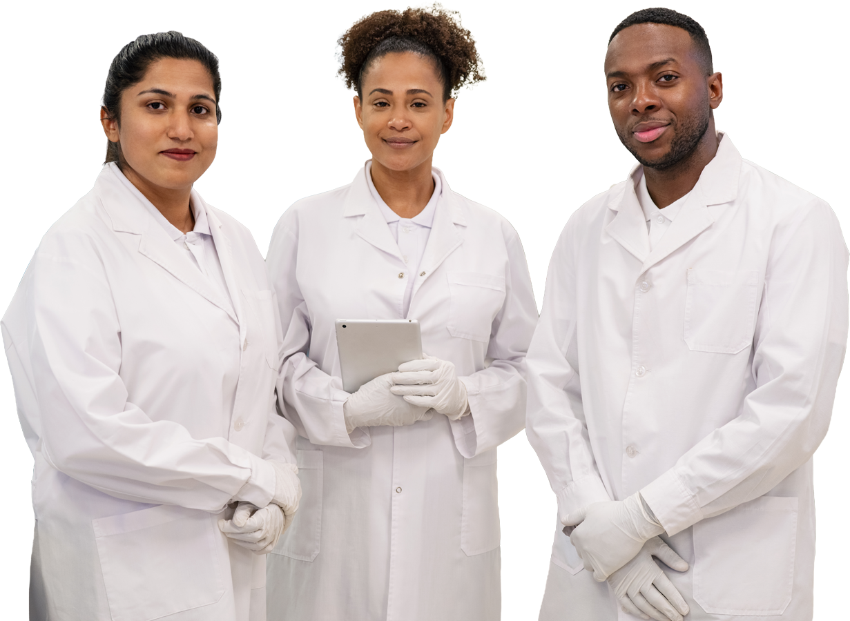 A group of scientists in lab coats smiling