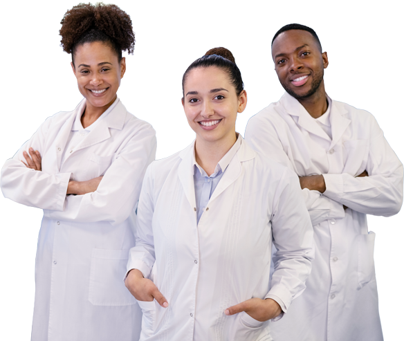 A group of young scientists in lab coats smiling