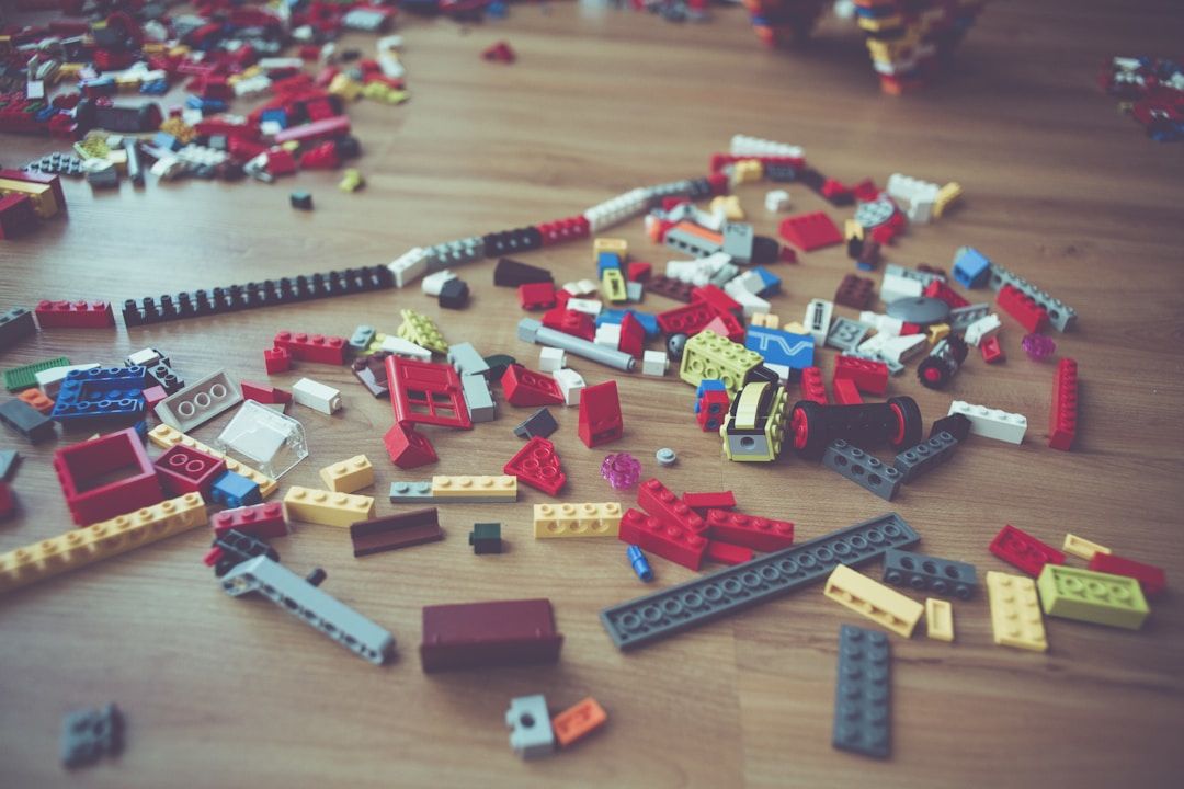 Photo of lego block scattered on a floor