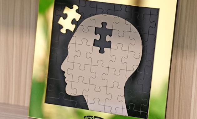 a picture of a head jigsaw with a piece missing