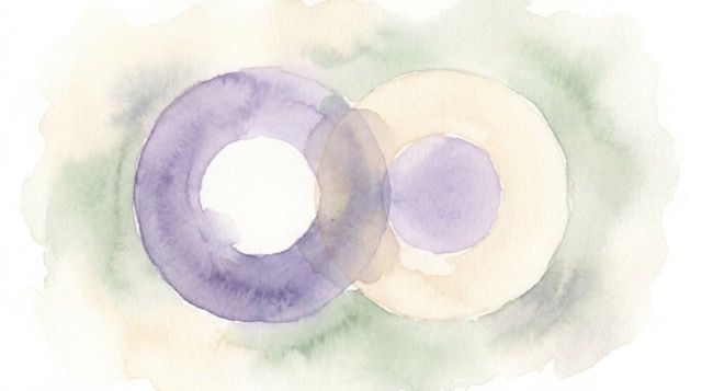 A vintage compass resting on soft purple fabric, symbolising finding your own direction