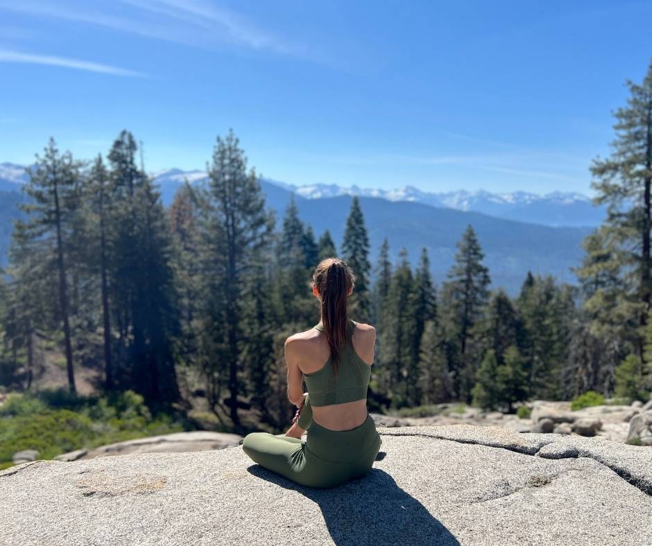woman sitting and meditating