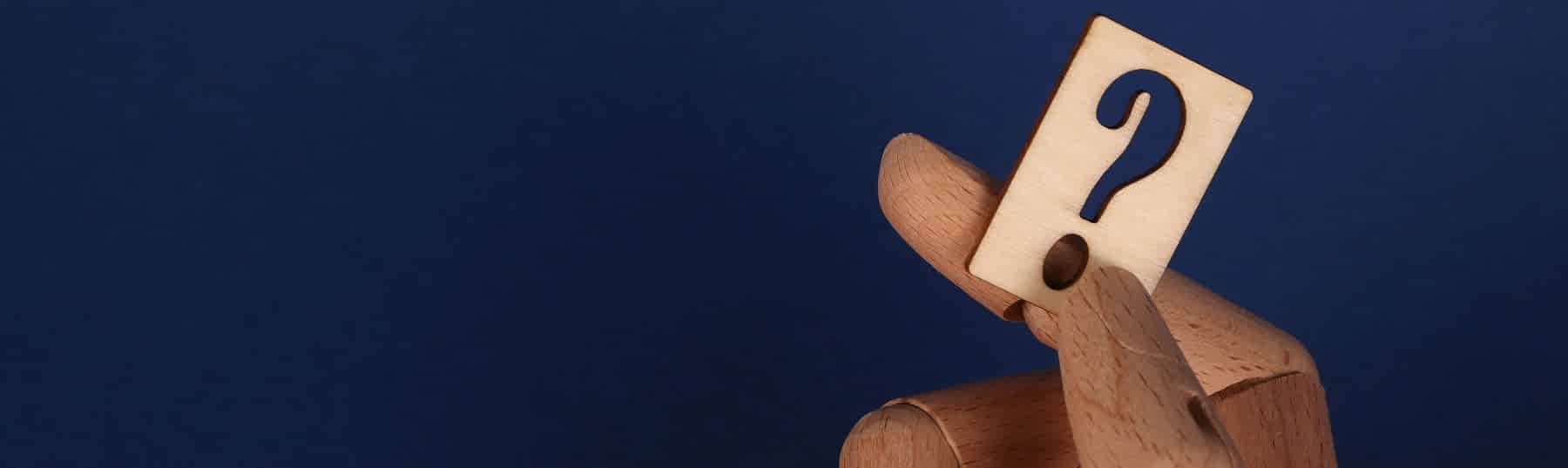question mark on wood card