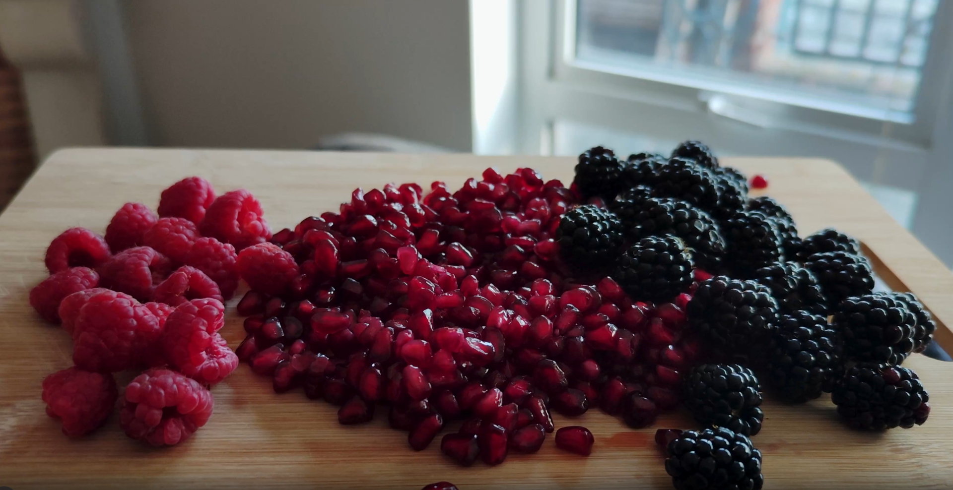 250 calories. Raspberries, pomegranate seeds, blackberries
