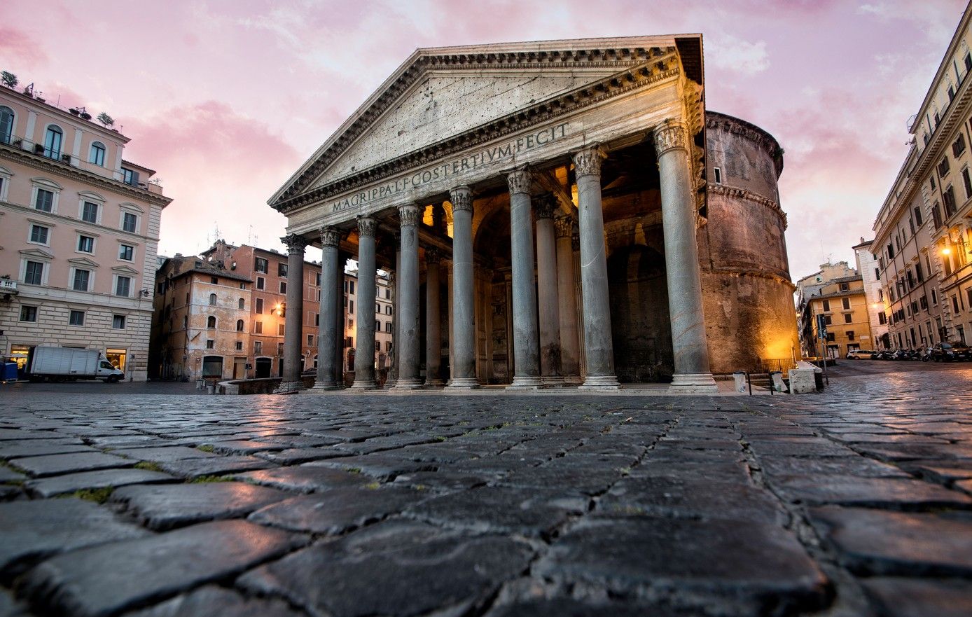 The Pantheon in Rome at sunset with cobblestone foreground