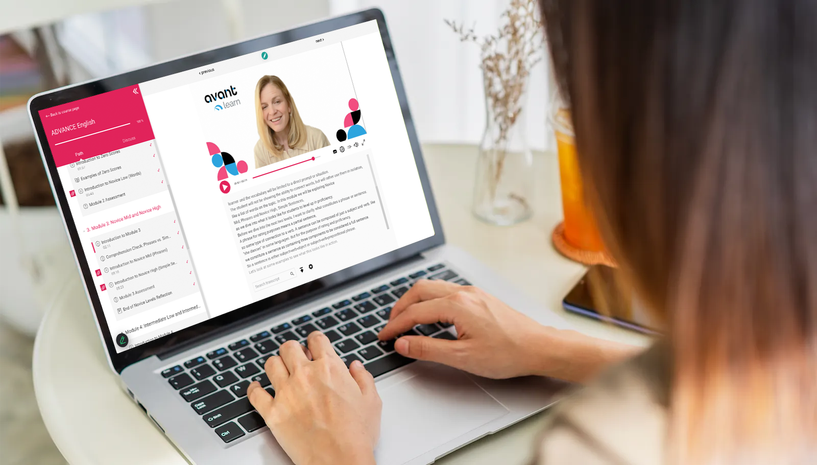 woman on her laptop and we see her completing the ADVANCE training online