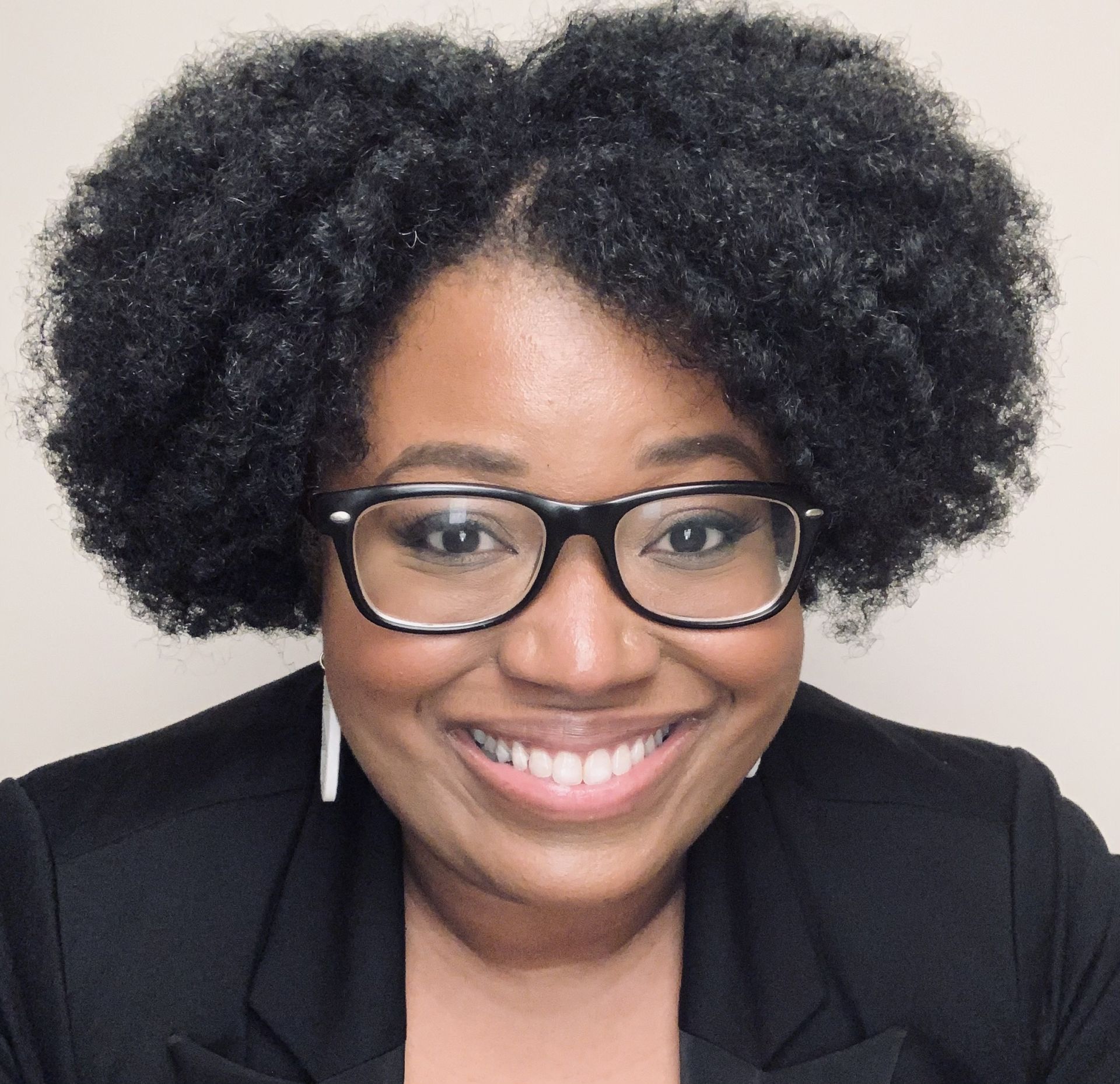 Jessica Isom, MD, MPH—board-certified community psychiatrist, clinical instructor at Yale, and racial equity consultant addressing the harms of pathologizing Blackness in medicine and mental health—featured for her Doin' The Work podcast episode.