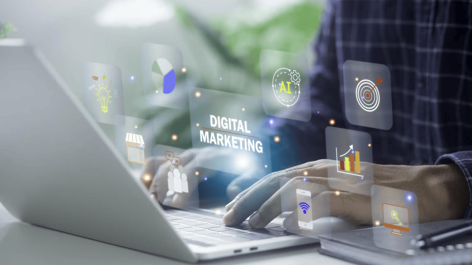 digital marketing graphic hovering over laptop keyboard