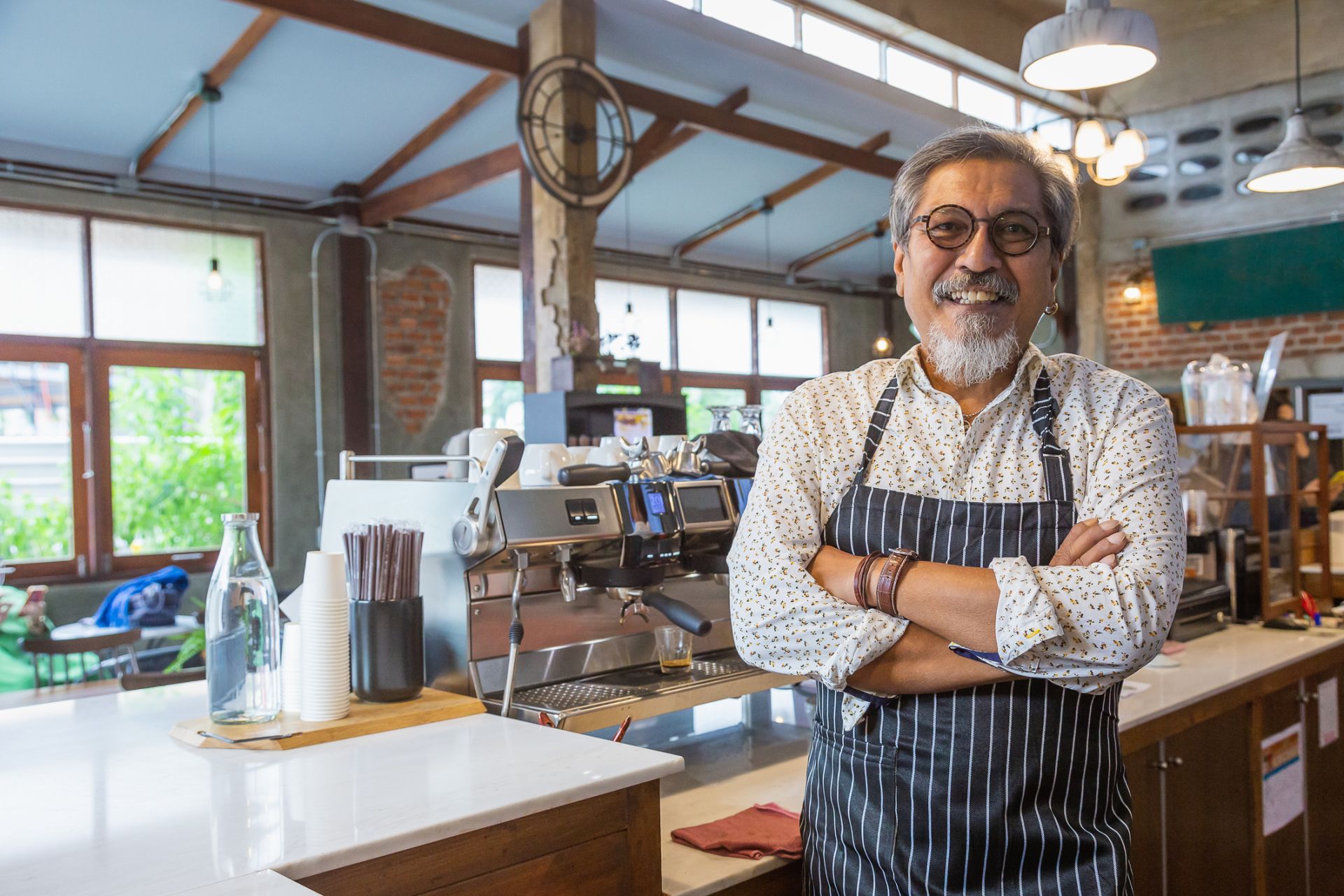 man working in a coffee shop