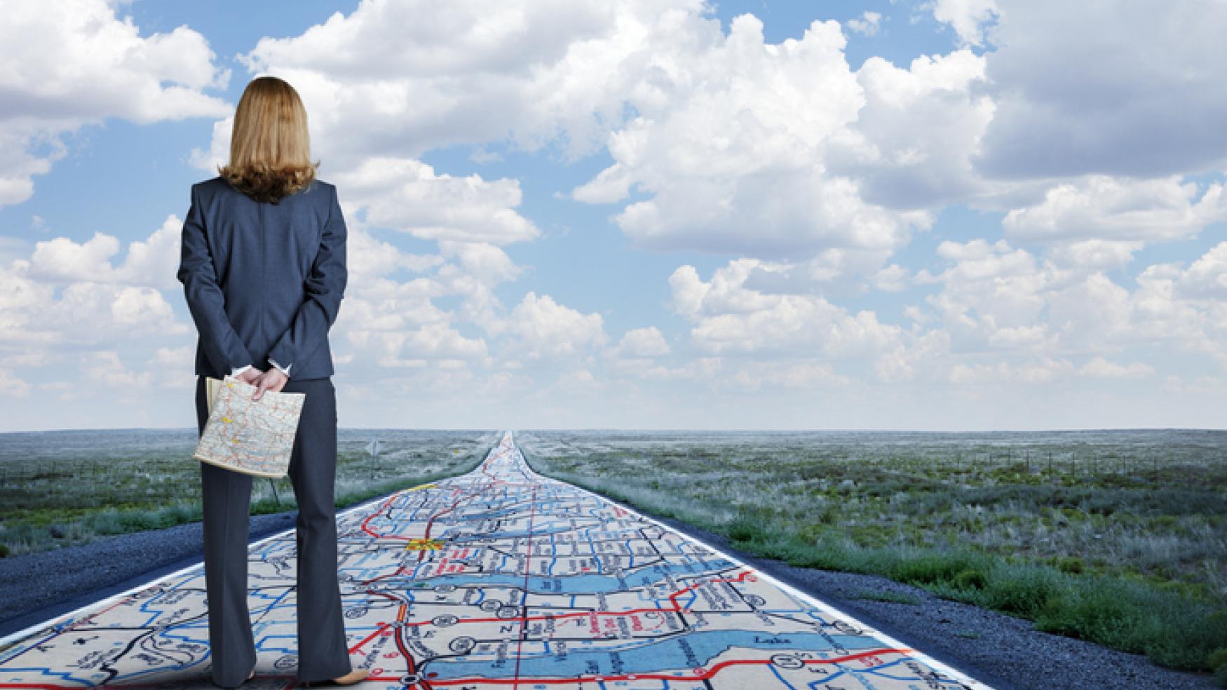 woman standing on a map