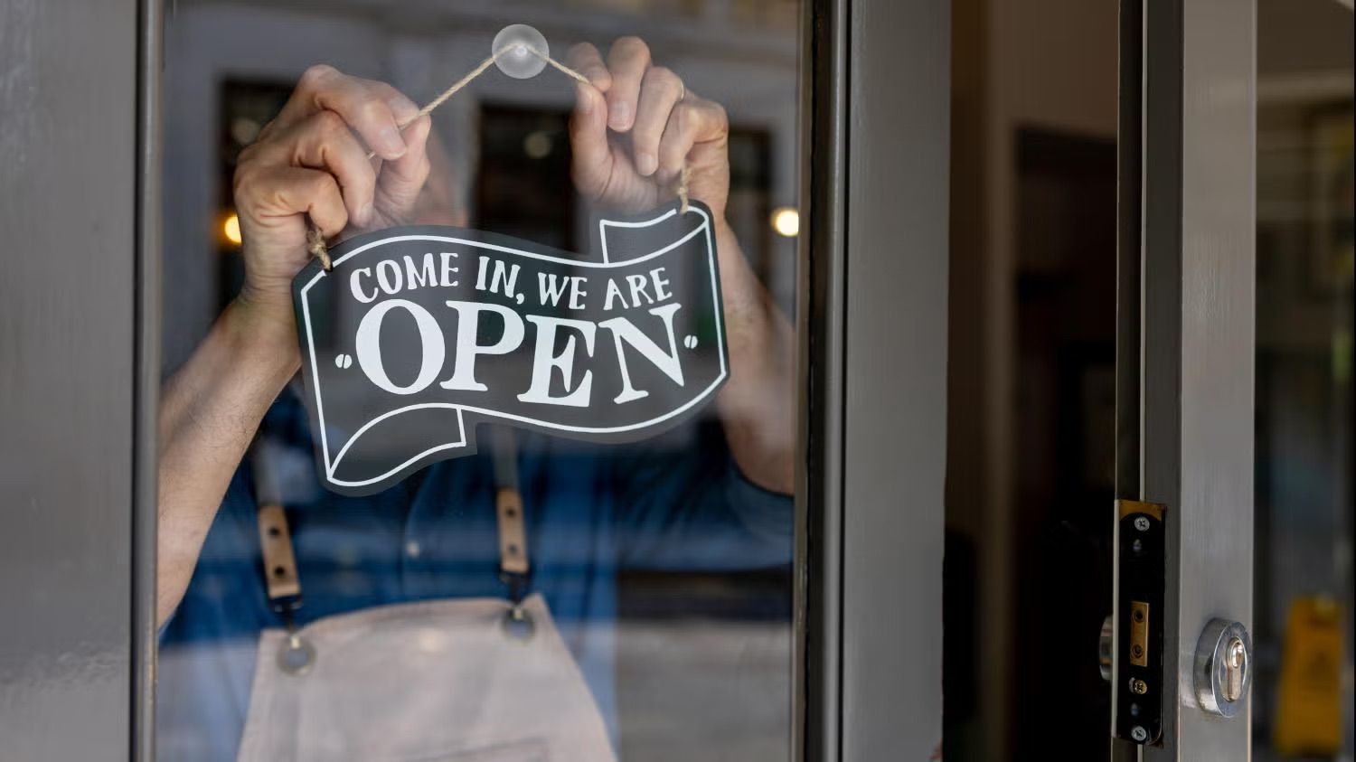 digital marketing graphic hovering over laptop keyboard