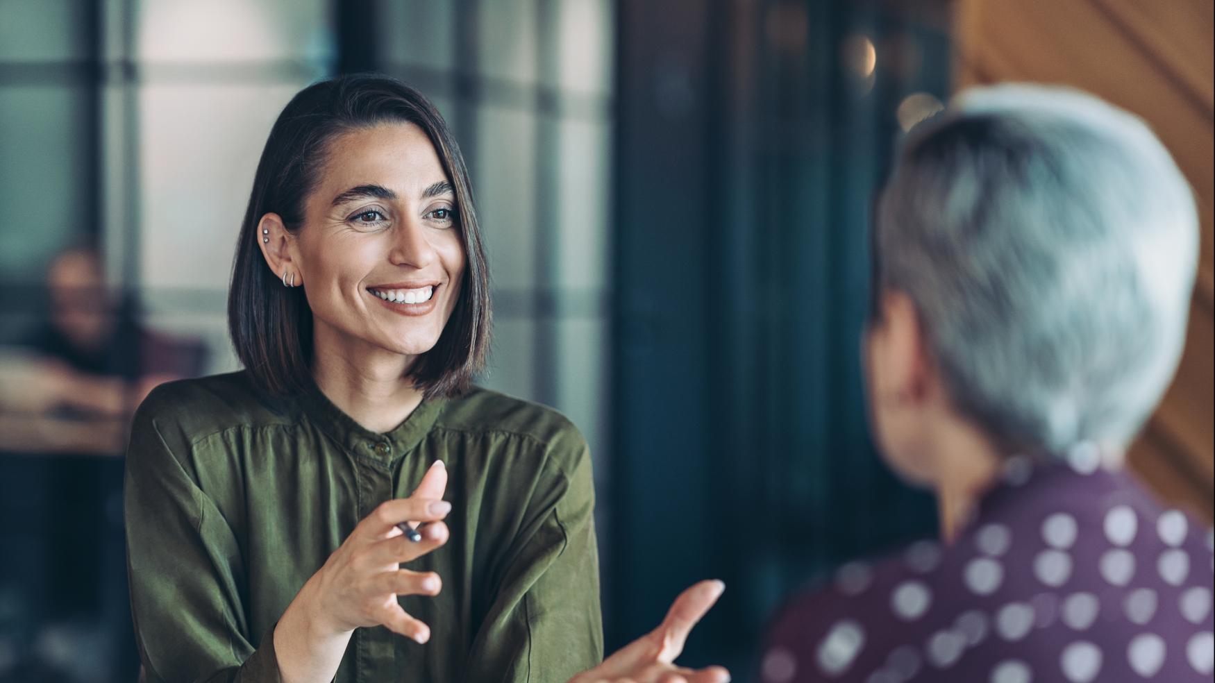 businesswoman writing in notebook