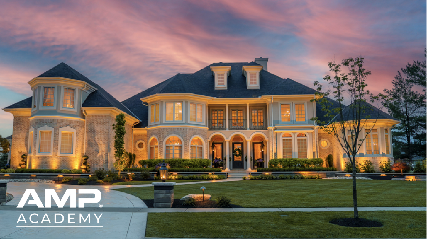 Large house lit up with landscape lighting