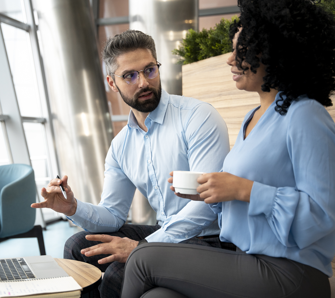 Two school leaders in a coaching conversation