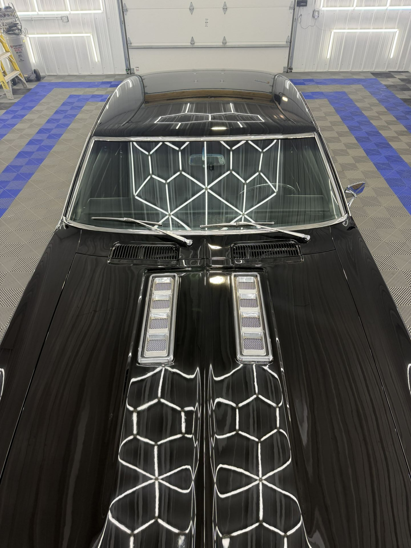 Paint correction and ceramic coating installation by Porters Detailing