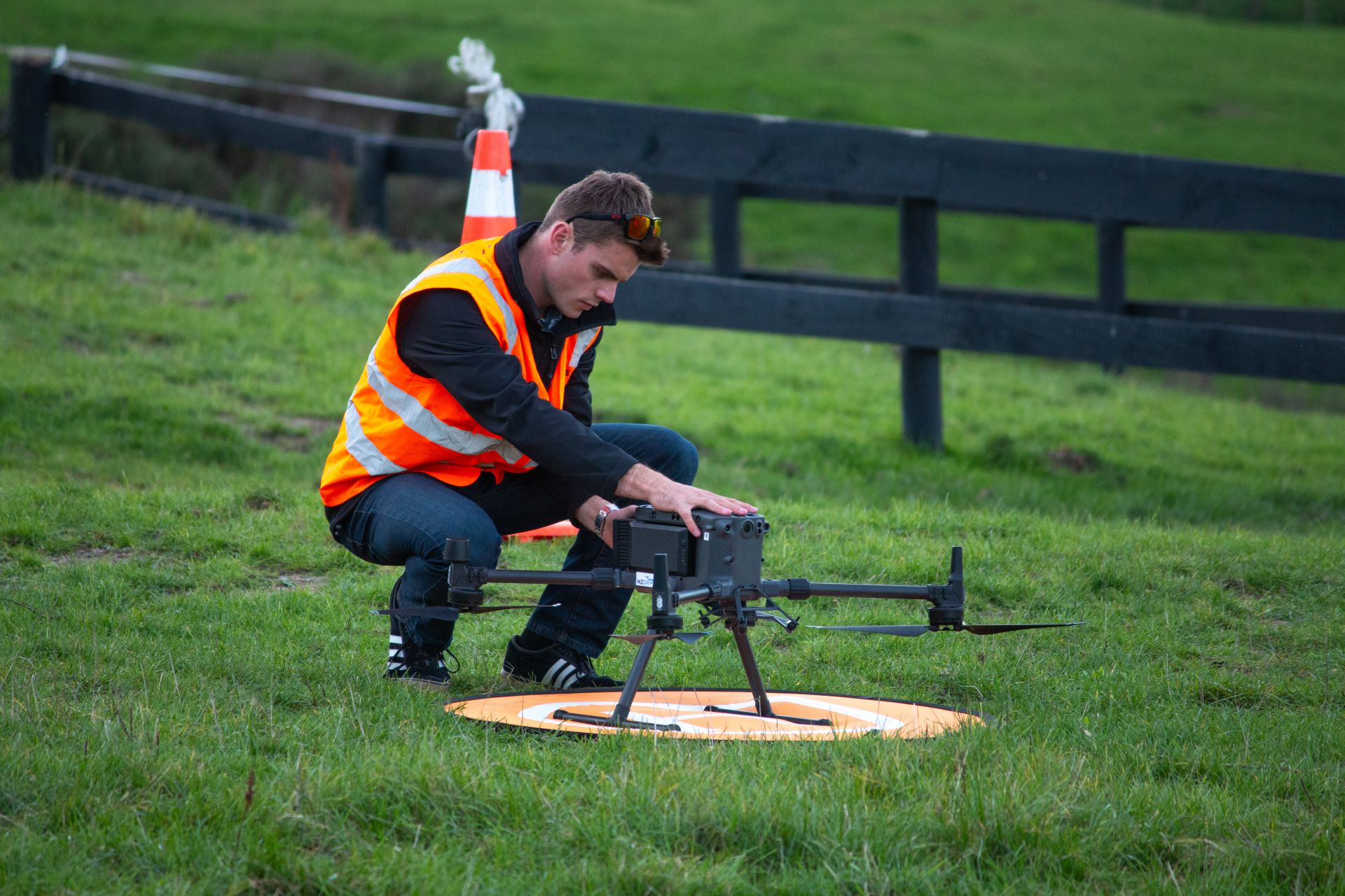 Pilot preparing a multirotor aircraft before flight