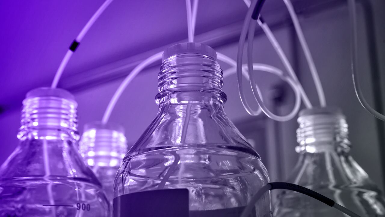 Graphic of chemicals being used for advanced HPLC | Advanced HPLC Method Development Using Quality by Design course from Analytical Training Solutions