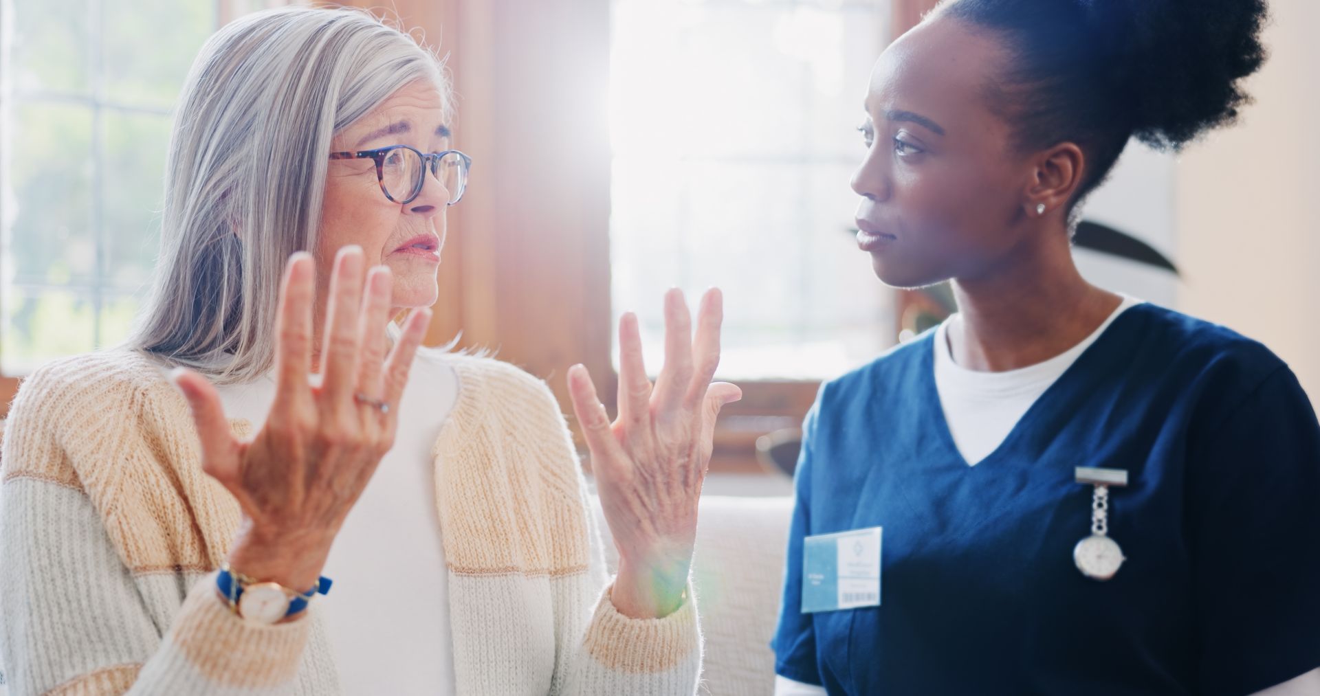 Frustrated nurse and patient discussing a medical treatment plan in a high-pressure clinic setting.