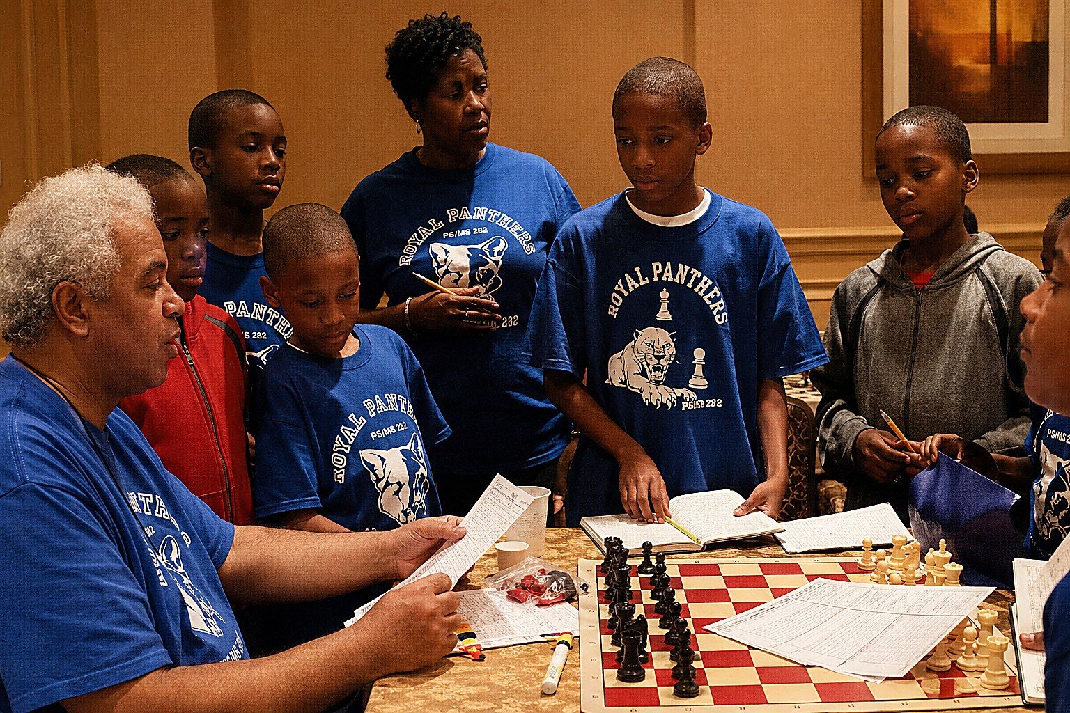 National Master Ernest Colding briefing his Chess Team.