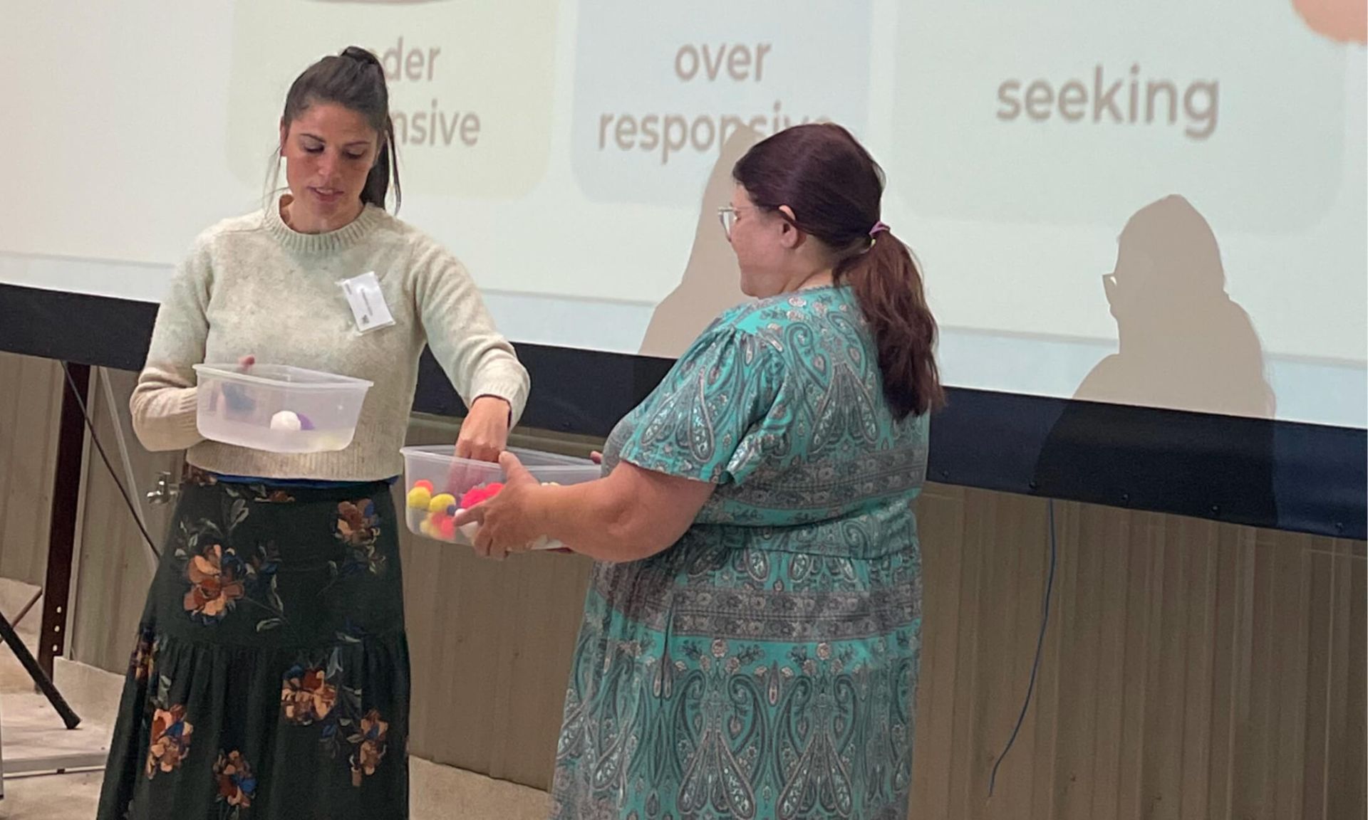 Kelly Goldberg instructing an in person training with child care providers