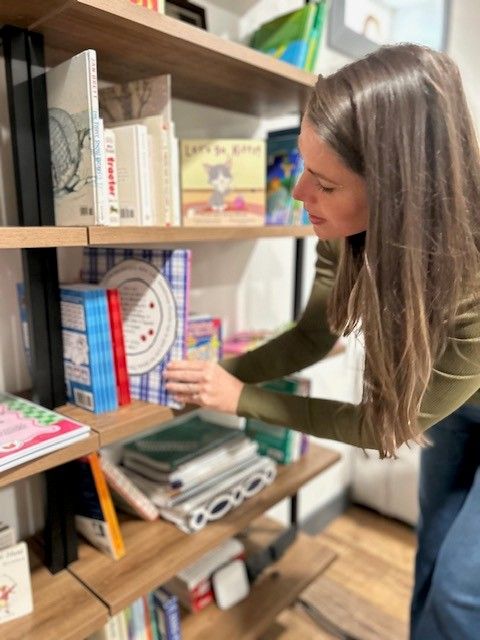 Speech-language pathologist preparing child care training materials for early childhood educators