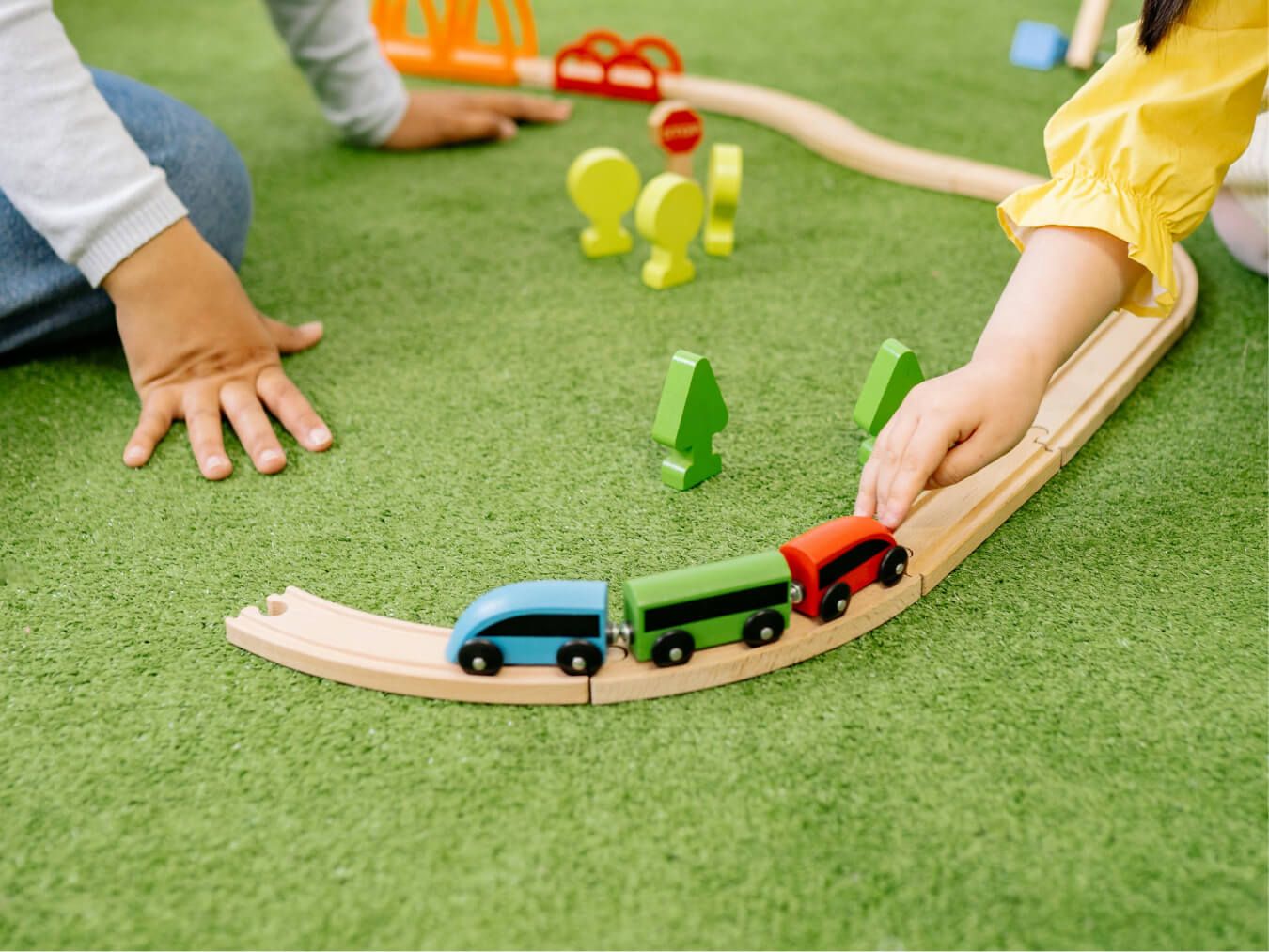 children playing with train set