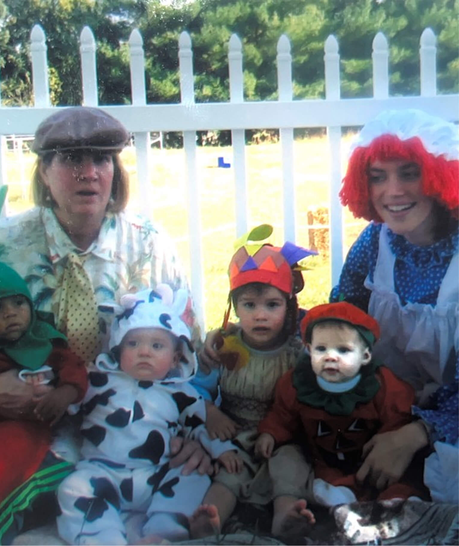 Kelly Goldberg early childhood education trainer with her mom at their home child care center with a few children from the child care